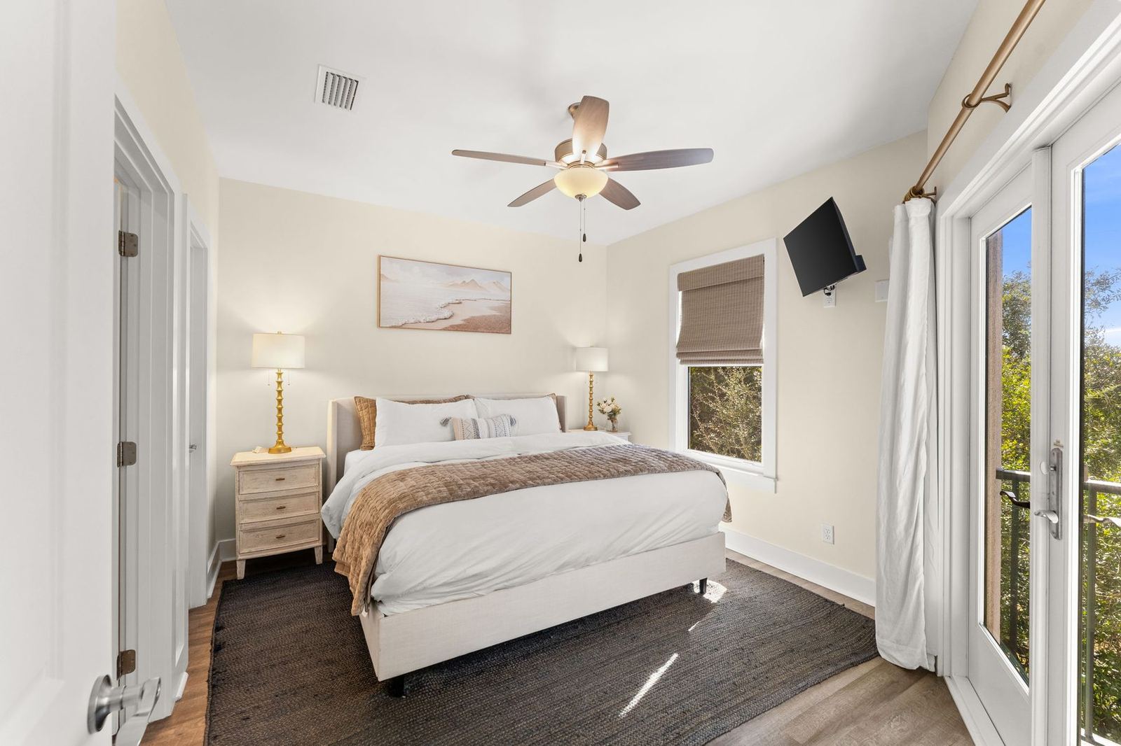 King master bedroom with private balcony at Cheeks on the Beach